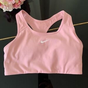 Nike Pink Sports Bra with Racerback Design and Moisture-Wicking Fabric Excellent